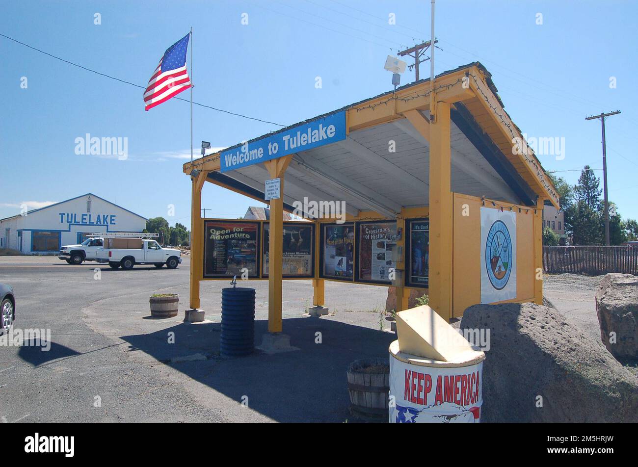 Volcanic Legacy Scenic Byway Visitor Information in Tulelake. A vibrant yellow visitor kiosk