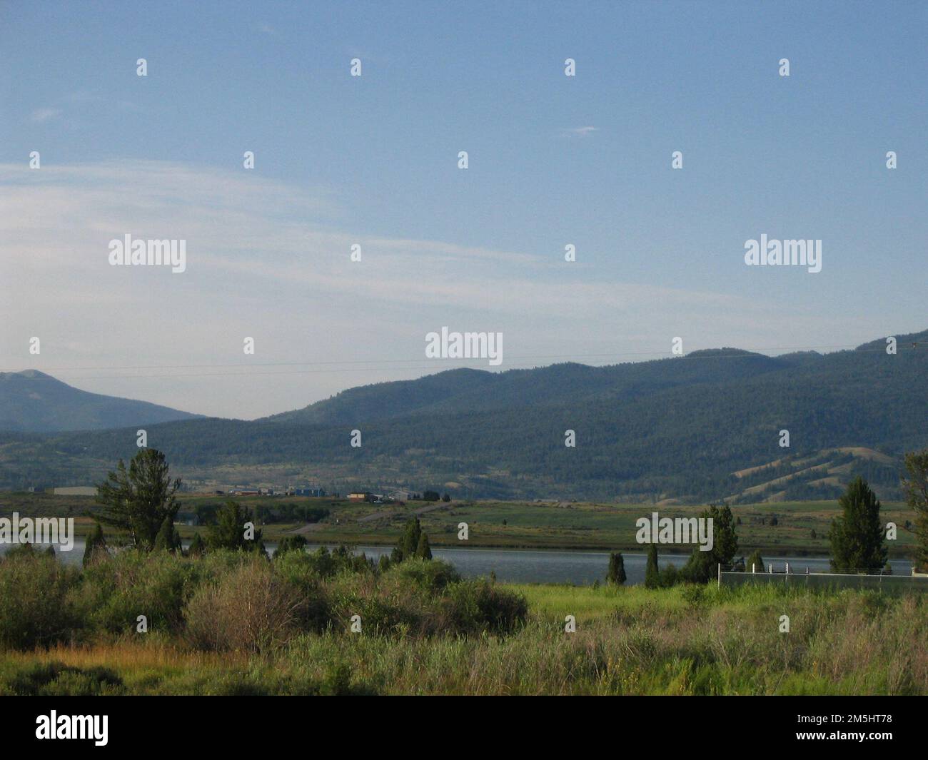 Pioneer Historic Byway Views of Soda Springs. Green foliage and water
