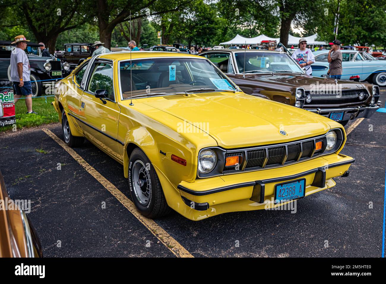 Iola, WI - July 07, 2022: High perspective front corner view of a 1977 AMC Hornet AMX Coupe at a local car show. Stock Photo