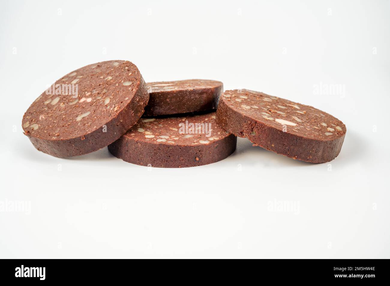 Thick slices of pork traditional butchers black pudding isolated on a