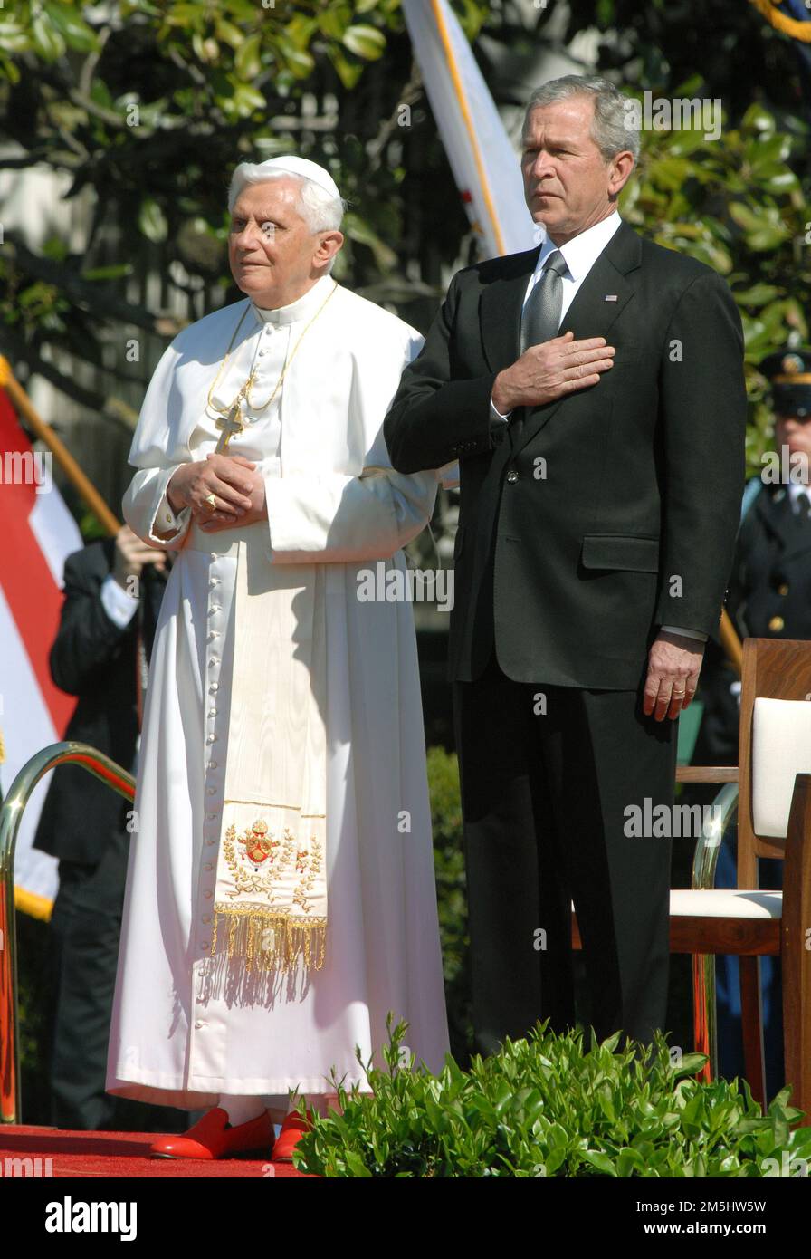 Washington, United States Of America. 16th Apr, 2008. Pope Benedict XVI, left, and United States President George W. Bush, right, stand at attention as the National Anthem is played as the Pontiff arrives at the White House in Washington, DC on Wednesday, April 16, 2008. Credit: Ron Sachs/CNP/Sipa USA.(RESTRICTION: NO New York or New Jersey Newspapers or newspapers within a 75 mile radius of New York City) Credit: Sipa USA/Alamy Live News Stock Photo
