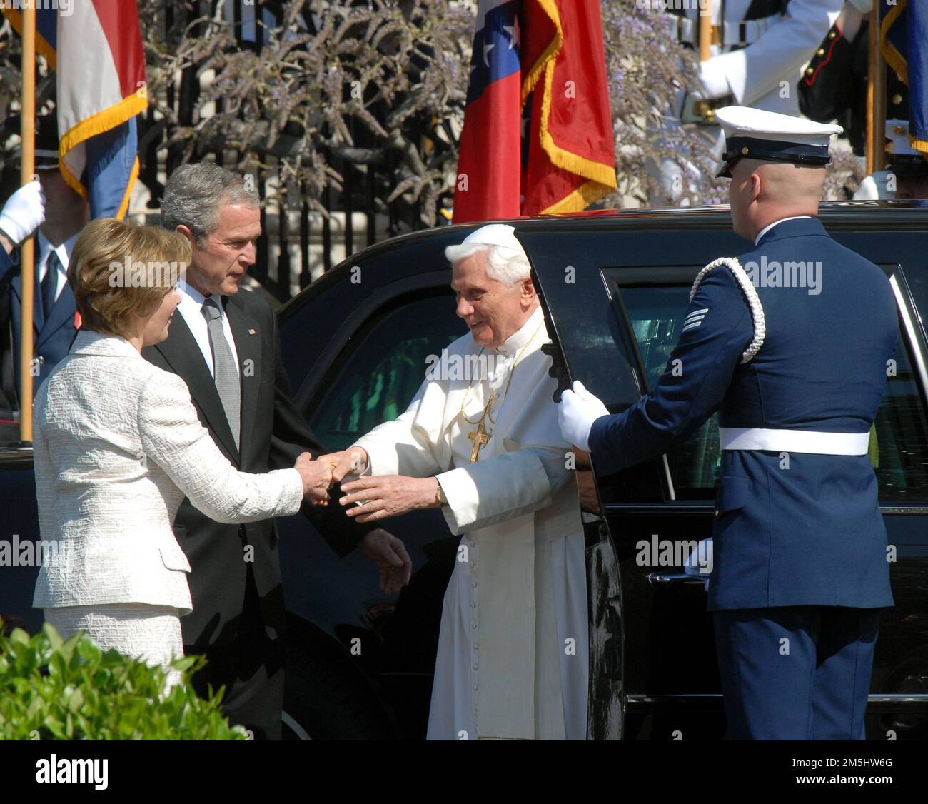 Washington, United States Of America. 16th Apr, 2008. Pope Benedict XVI, right, is greeted by first lady Laura Bush, left, and United States President George W. Bush, center as he arrives at the White House in Washington, DC on Wednesday, April 16, 2008. Credit: Ron Sachs/CNP/Sipa USA.(RESTRICTION: NO New York or New Jersey Newspapers or newspapers within a 75 mile radius of New York City) Credit: Sipa USA/Alamy Live News Stock Photo