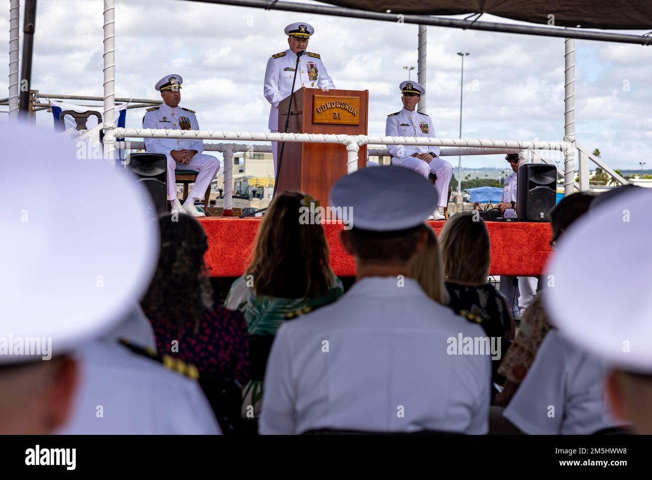 220318-N-OT701-1042 JOINT BASE PEARL HARBOR-HICKAM (Mar. 18, 2021) Rear Adm. Timothy Kott, Commander, Naval Surface Group Middle Pacific, speaks during a change of command ceremony. Capt. Ken Athans was relieved by Capt. Don Rauch as Commander, Destroyer Squadron 31 during the ceremony. Stock Photo