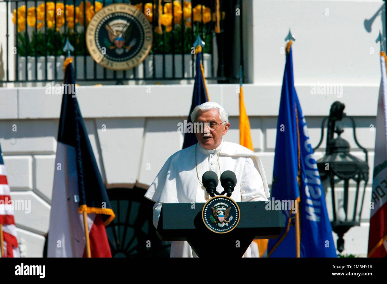 Pope Benedict XVI makes a speech during the Arrival Ceremony hosted by United States President George W. Bush and first lady Laura Bush in his honor on the South Lawn of the White House, Washington DC, April 16, 2008. Credit: Aude Guerrucci / Pool via CNP Stock Photo