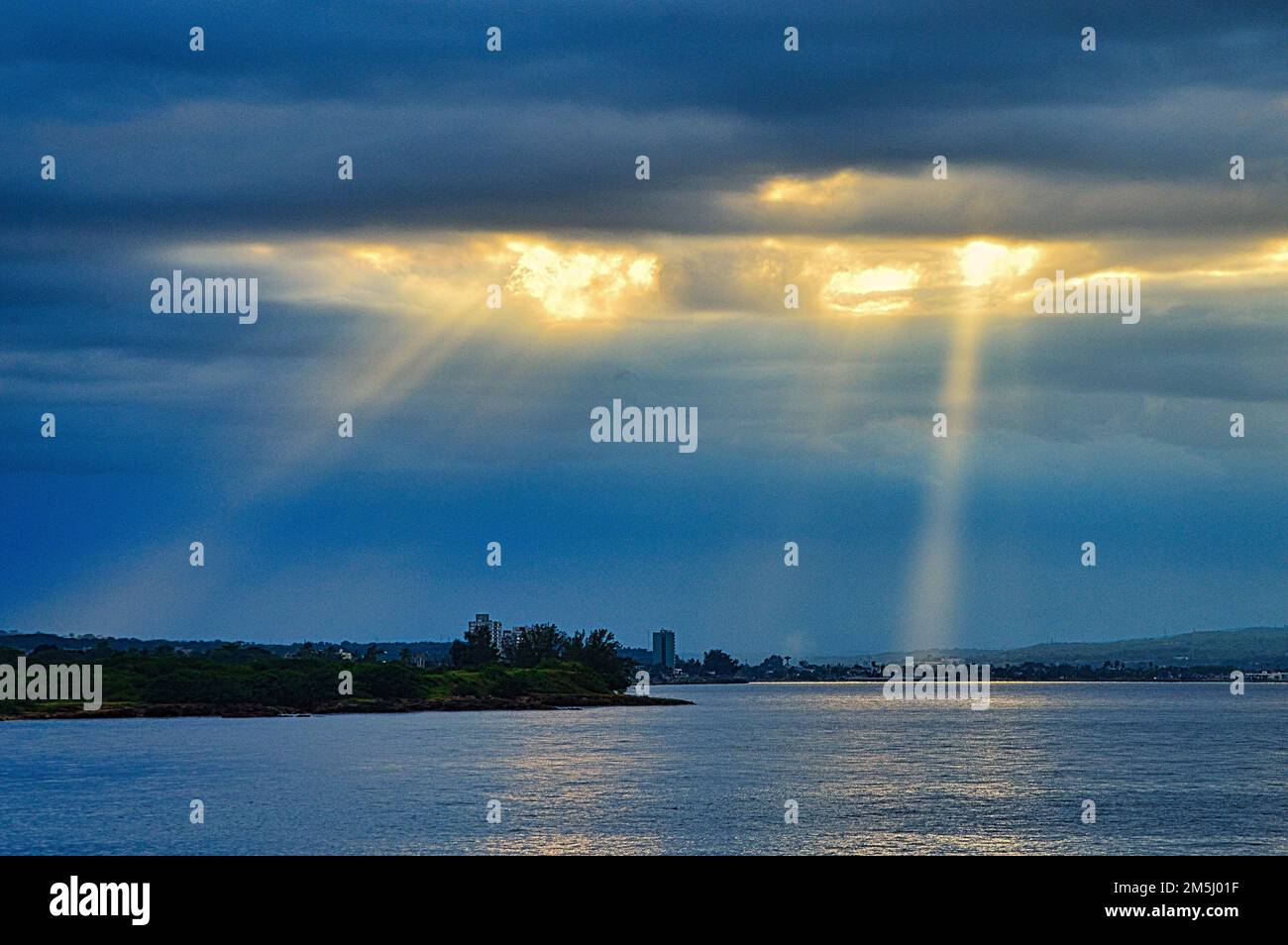 Slanting Rays the sunset at the bay of Matanzas, Cuba, the slanting rays shining ...