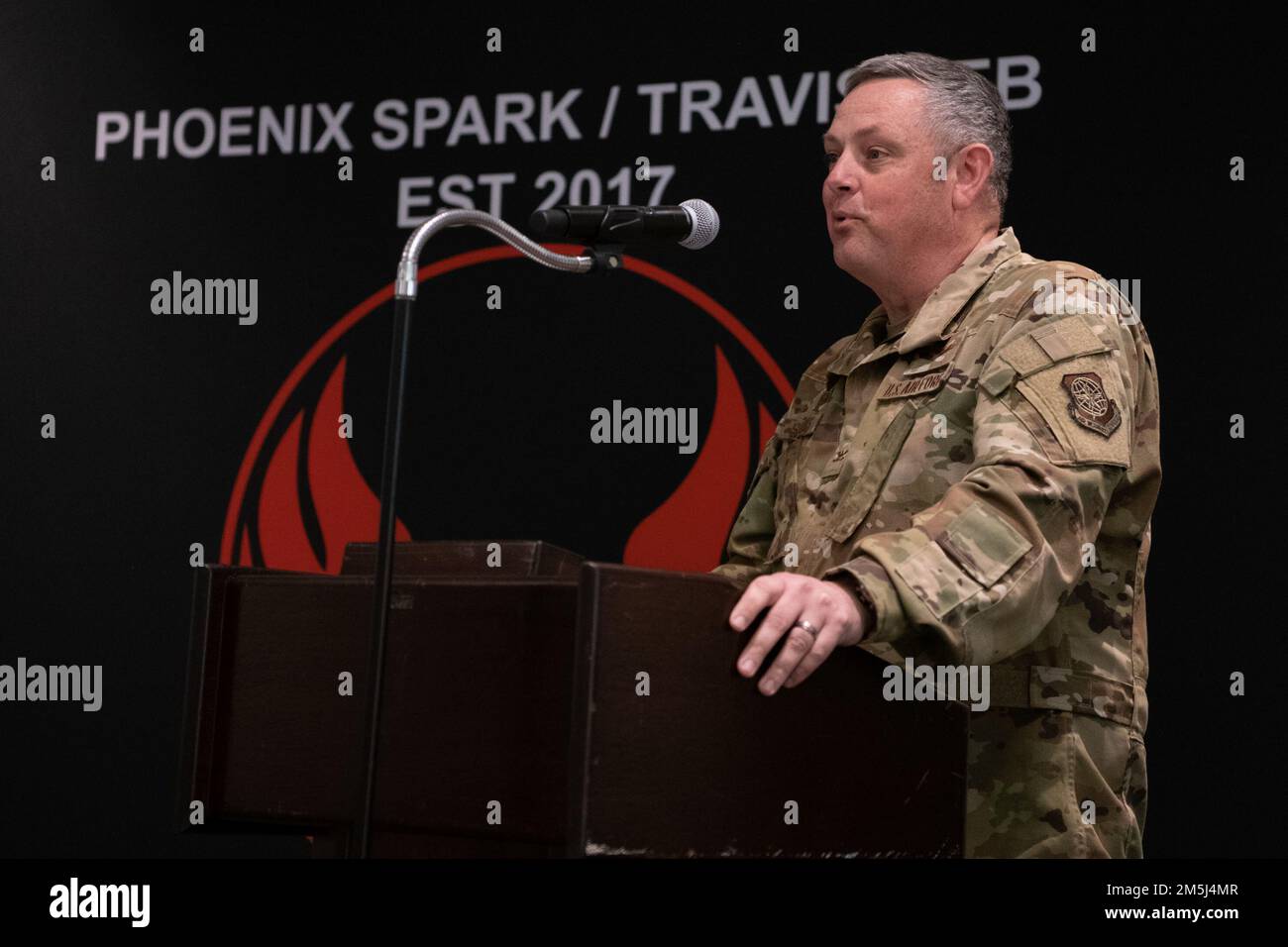 U.S. Air Force Col. Corey Simmons, 60th Air Mobility Wing commander, gives closing remarks during the Travis Air Force Base Spark Tank 2022 Finals at Travis AFB, California, March 18, 2022. Phoenix Spark hosted the Travis AFB Spark Tank 2022. It recognized the top six finalists from a field of 55 ideas submitted by Travis Airmen to the inaugural Squadron Innovation Funds Sparks Tank. The ideas varied from a six-figure software system to simple purchases of off-network machines. Stock Photo