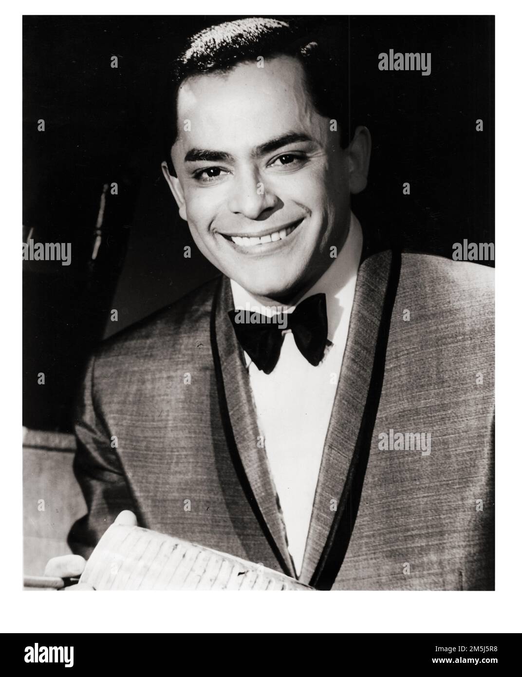 A publicity photo of Tito Rodiguez, a Puerto Rican singer and bandleader who was influential in popularizing Latin music, Latin jazz and Latin dance. Circa 1950s. Stock Photo