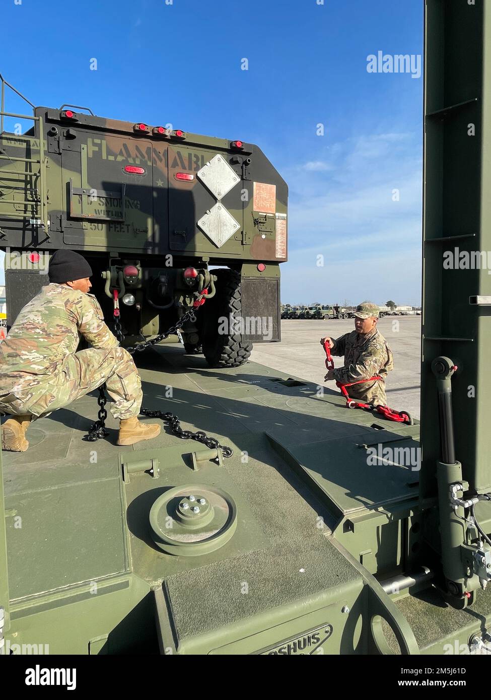 Soldiers from the 96th Transportation - Soldiers From The 96th Transportation Company Secure An Army Prepositioned Stocks 2 Equipment Piece To The Back Of A Heavy Equipment Transporter March 17 In Preparation For Movement Of That Aps 2 Equipment From Army Field Support Battalion Mannheims Coleman Worksite In Mannheim Germany To Grafenwoehr Germany In Grafenwoehr The Equipment Will Be Issued To The 1st Armored Brigade Combat Team 3rd Infantry Division Which Is Deployed To Europe To Help Assure The United States Allies And Deter Russian Aggression Against Nato The 96th Trans Co Is Assigned To The 553rd Combat Sustainment 2M5J61D 