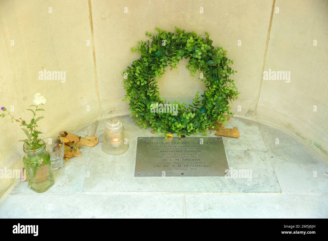 A plaque related to a Mahatma Gandhi statue is seen in Tavistock Square, central London. Stock Photo