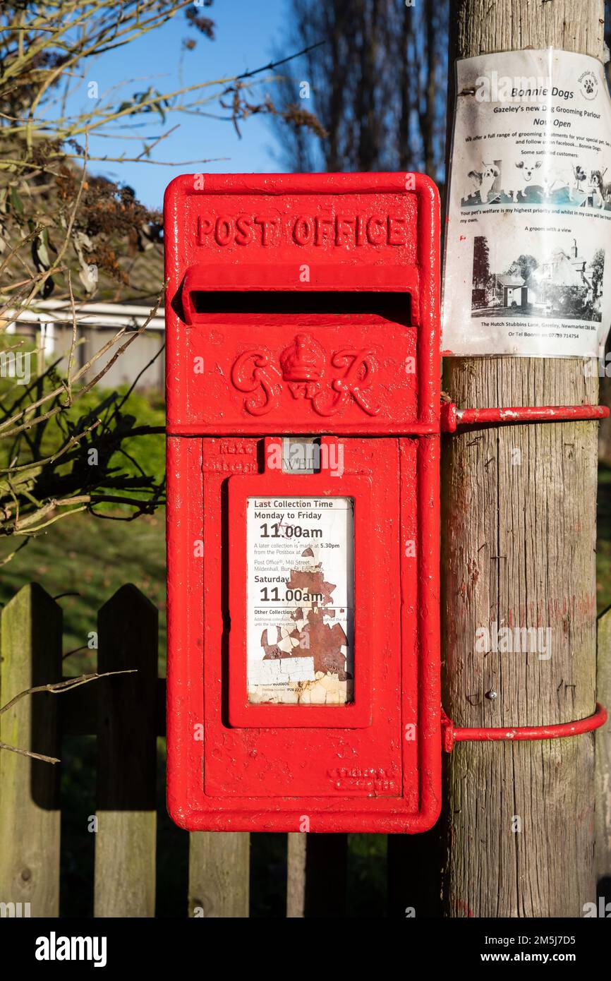 GR letter box attached to a telegraph pole in Red Lodge, Suffolk,UK