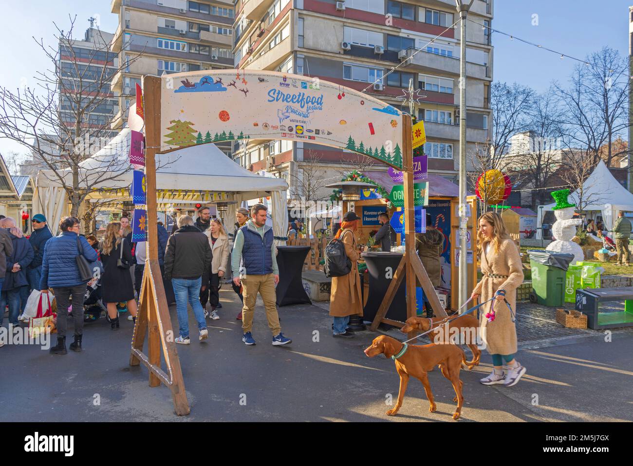 Belgrade, Serbia - December 25, 2022: Crowd of People at Street Food
