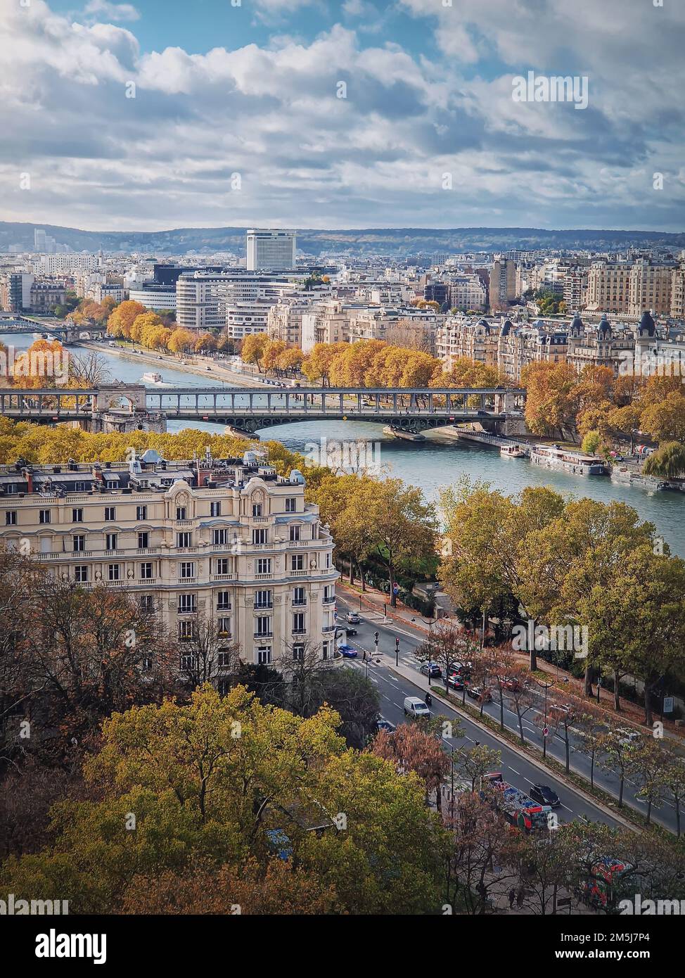 Aerial view of Paris city, France. Scenery fall season cityscape with yellow trees along Seine riverbank Stock Photo