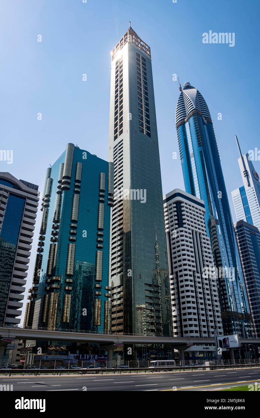 Gevora Hotel view from the Sheikh Zayed road and the sun reflecting on the top of the building, Dubai, United Arab Emirates Stock Photo
