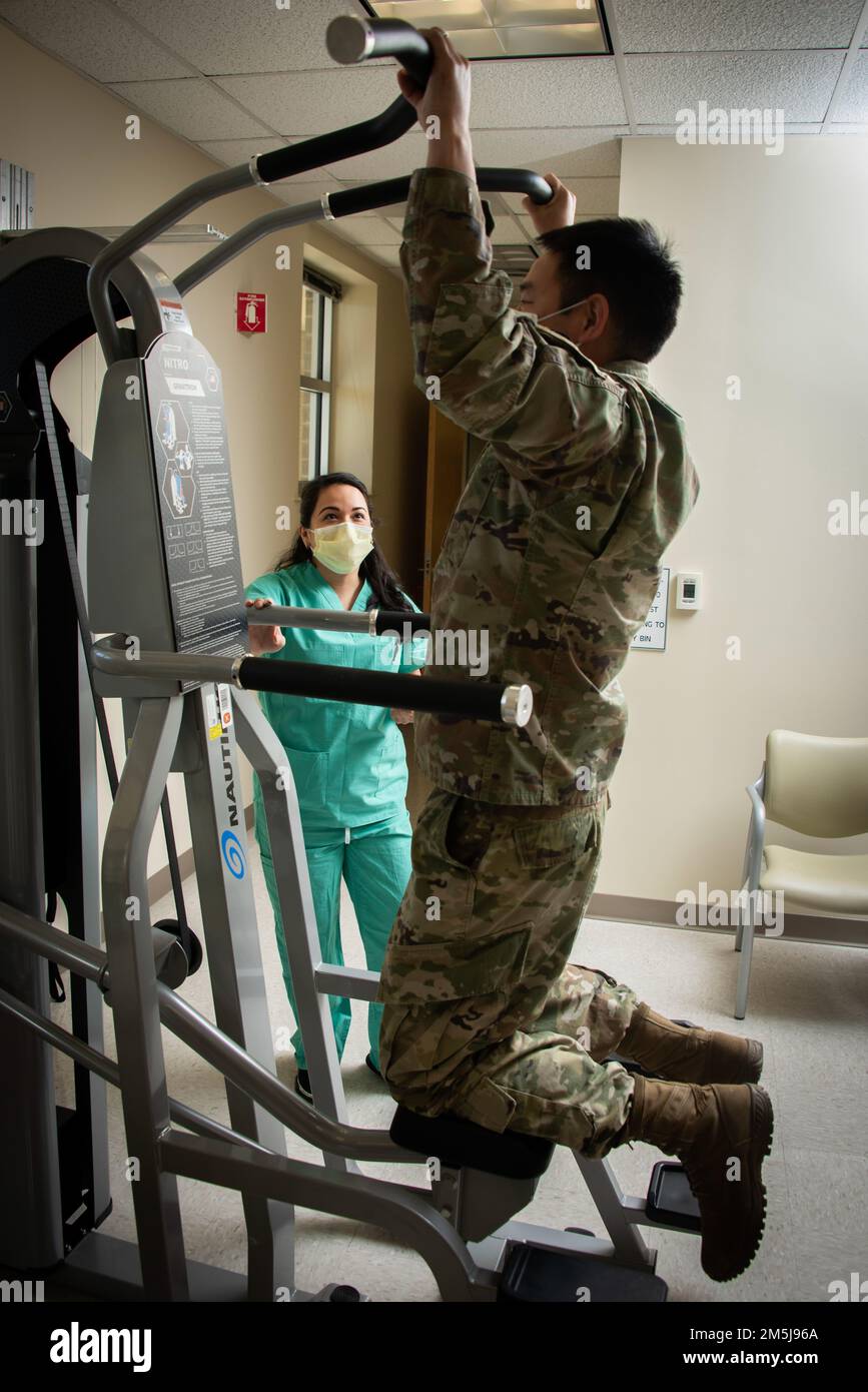 Adriana TrejoDavis, certified occupational therapy assistant, assists