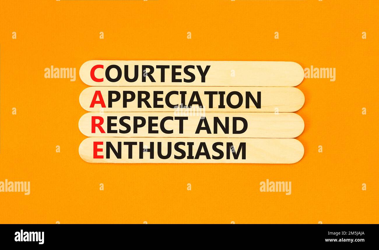 CARE symbol. Concept words CARE courtesy appreciation respect and enthusiasm on wooden stick on beautiful orange background. Business CARE courtesy ap Stock Photo