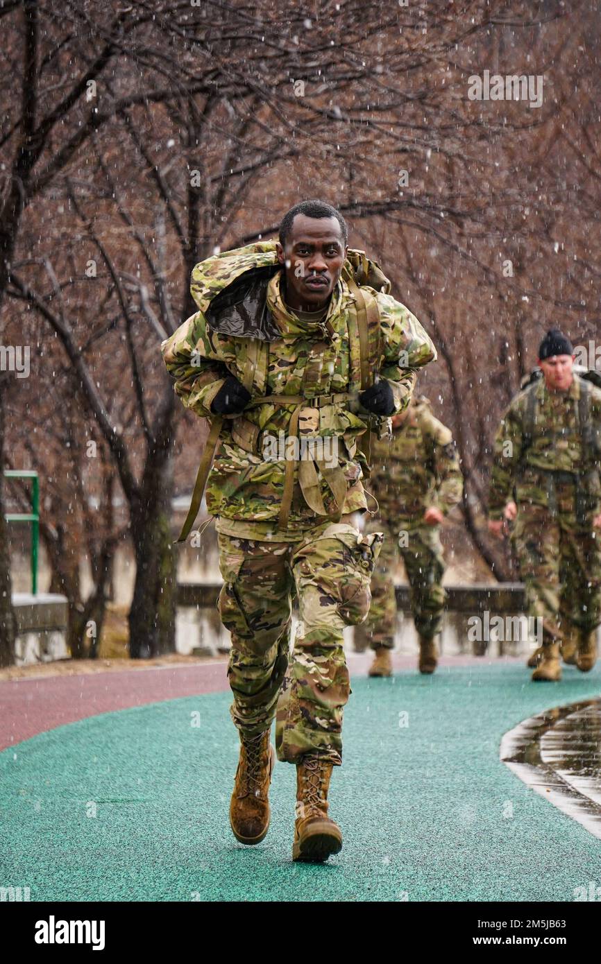 220319-A-DZ781-0004 South Korea (March 19, 2022) U.S. ARMY SOLDIERS conduct a ruck march, on Camp Casey South Korea, in honer of the Bataan Death March  .The Bataan Death March took place in April 1942, where American and Filipino prisoners of war were forced to walk 66 miles. Stock Photo