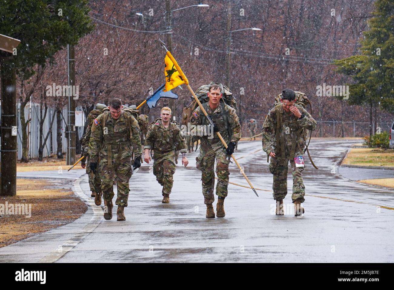 220319-A-DZ781-0011 South Korea (March 19, 2022) U.S. ARMY SOLDIERS conduct a ruck march, on Camp Casey South Korea, in honer of the Bataan Death March  .The Bataan Death March took place in April 1942, where American and Filipino prisoners of war were forced to walk 66 miles. Stock Photo
