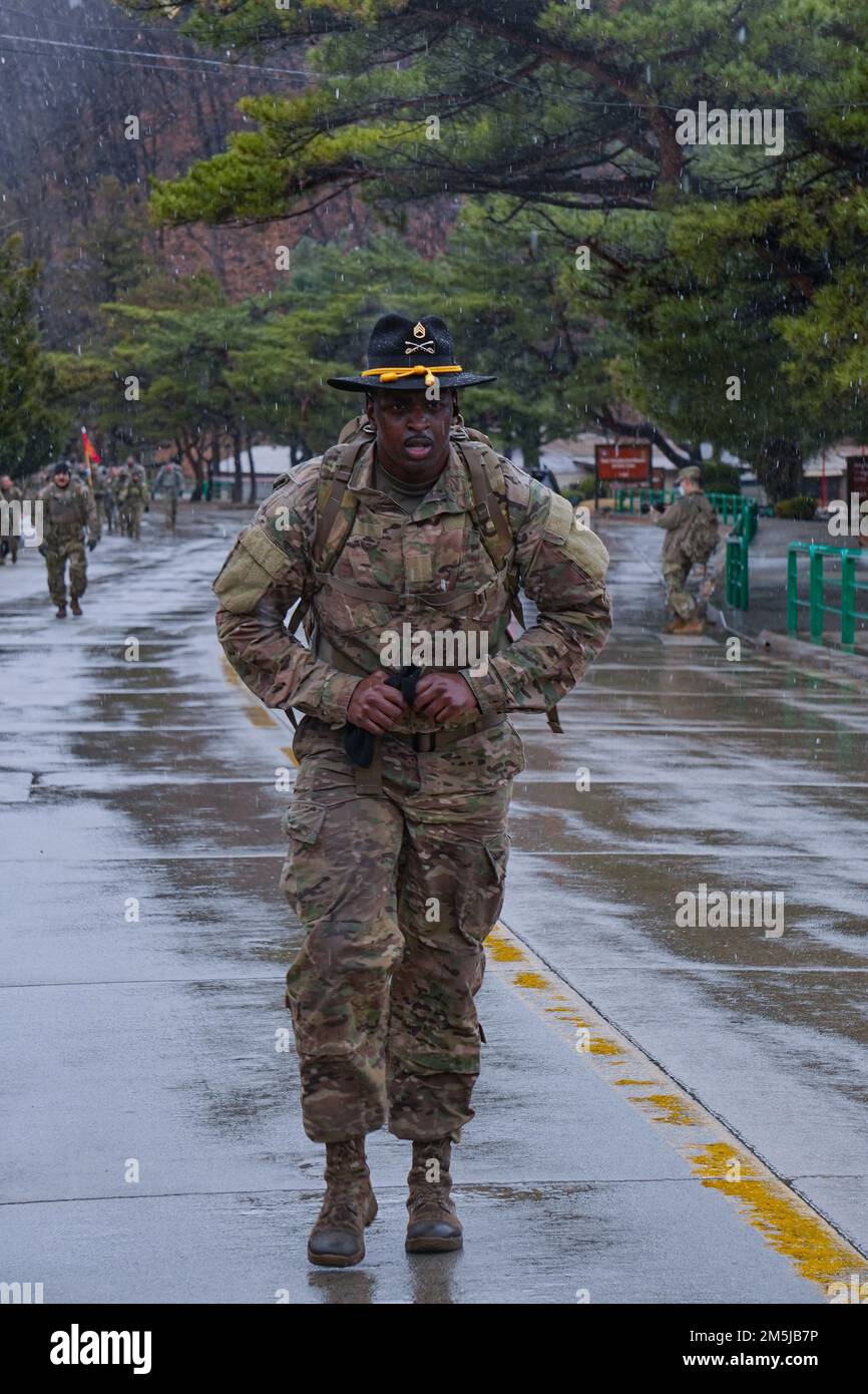 220319-A-DZ781-0009 South Korea (March 19, 2022) U.S. ARMY SOLDIERS conduct a ruck march, on Camp Casey South Korea, in honer of the Bataan Death March  .The Bataan Death March took place in April 1942, where American and Filipino prisoners of war were forced to walk 66 miles. Stock Photo