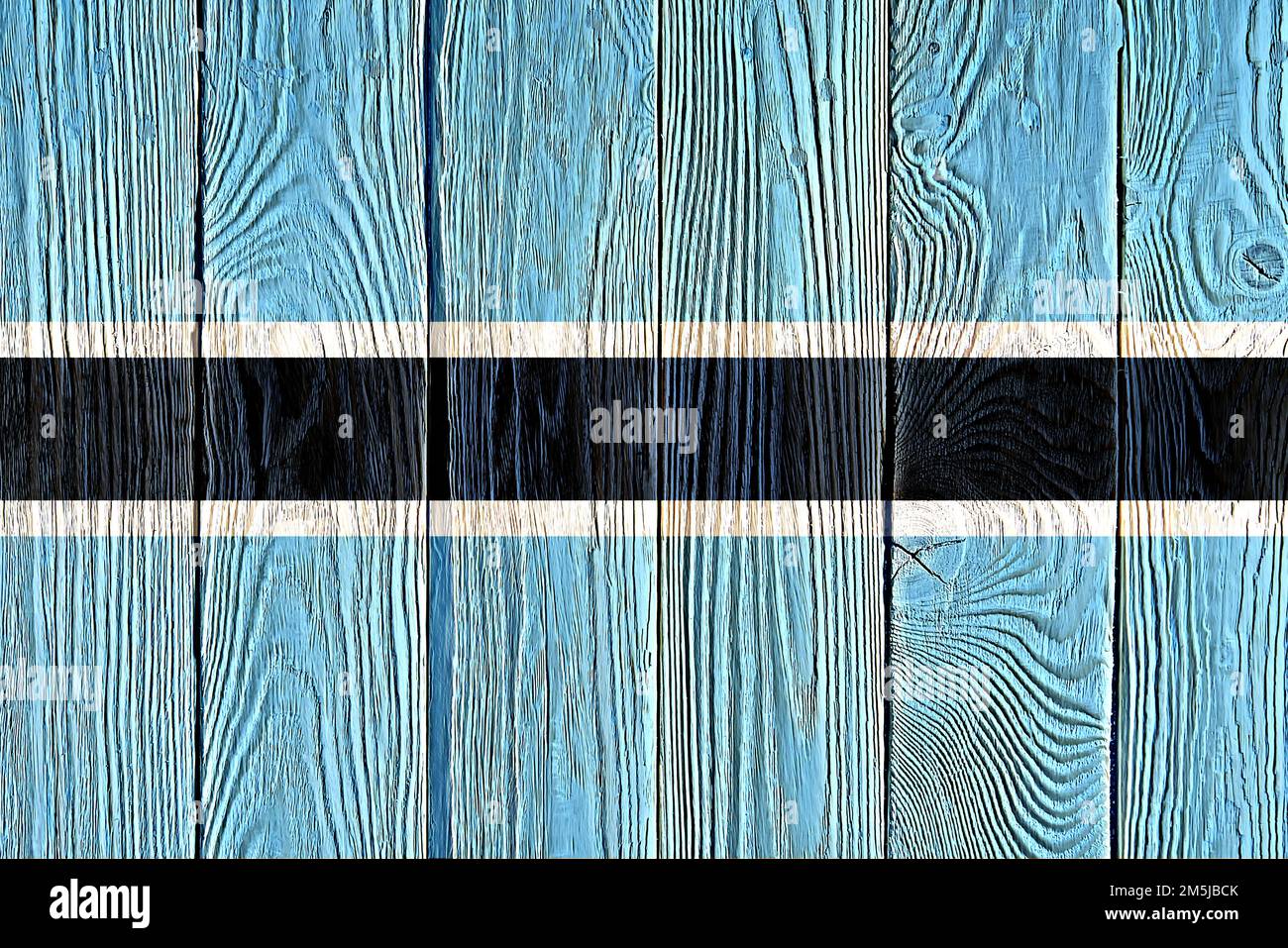 Botswana flag painted on old wood plank background. Brushed natural ...
