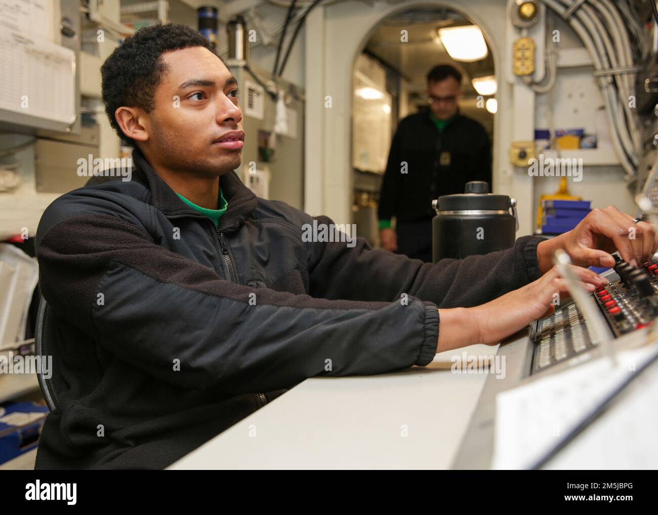 PHILIPPINE SEA (March 19, 2022) Electrician’s Mate 3rd Class Nicholas