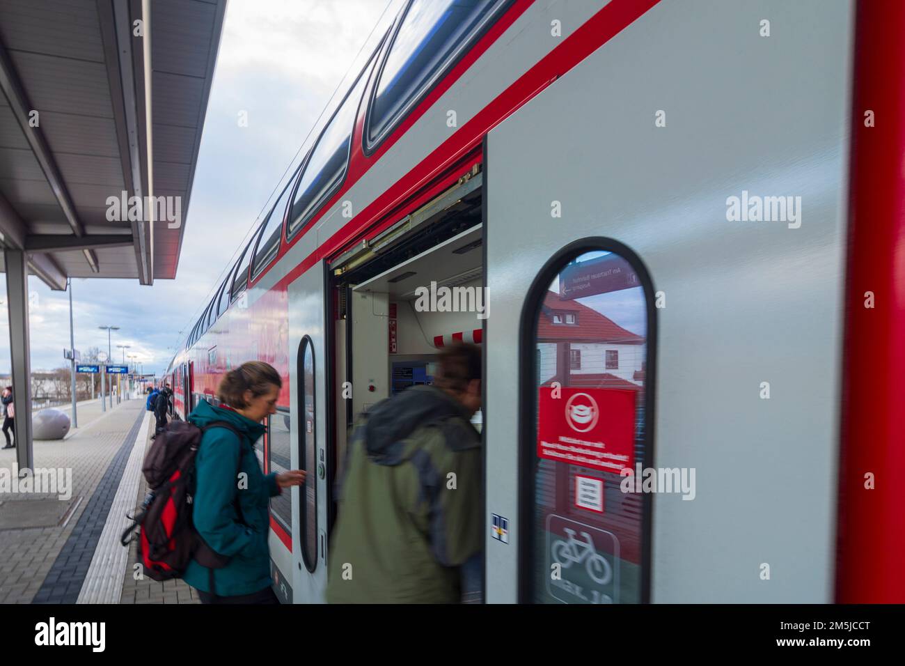 Dresden passengers at platform entering SBahn train in , Sachsen