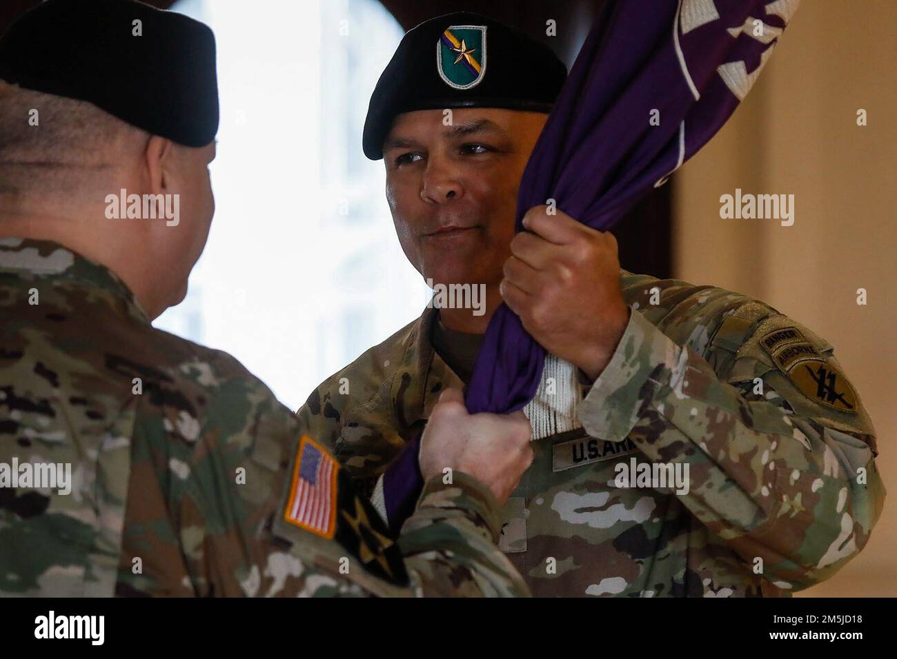 Sgt. Timothy Elder of the 149th VCC dons the IR flag patch that