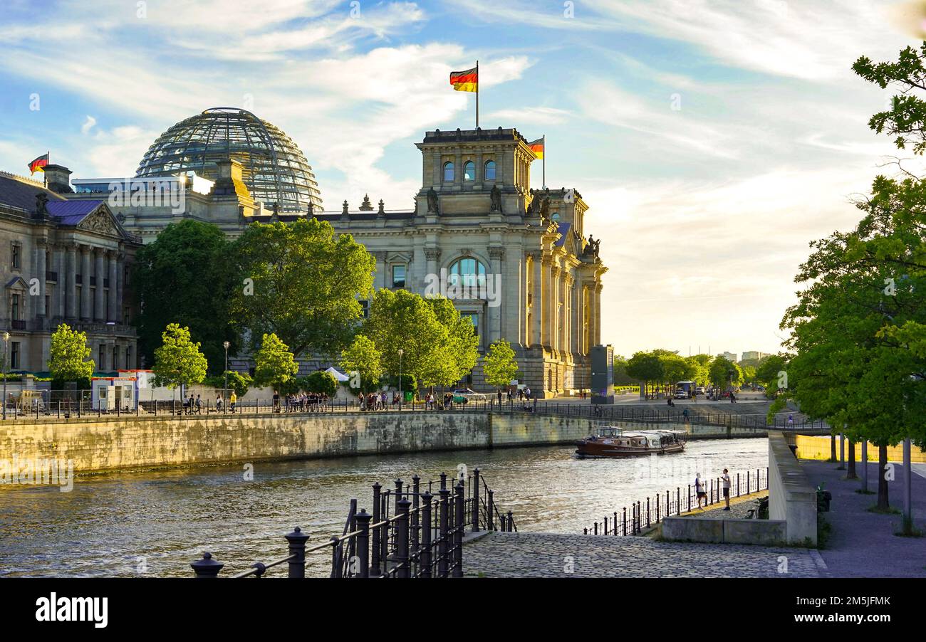 Reichstag builing in Berlin-Tiergarten by river Spree housing the German parliament Stock Photo