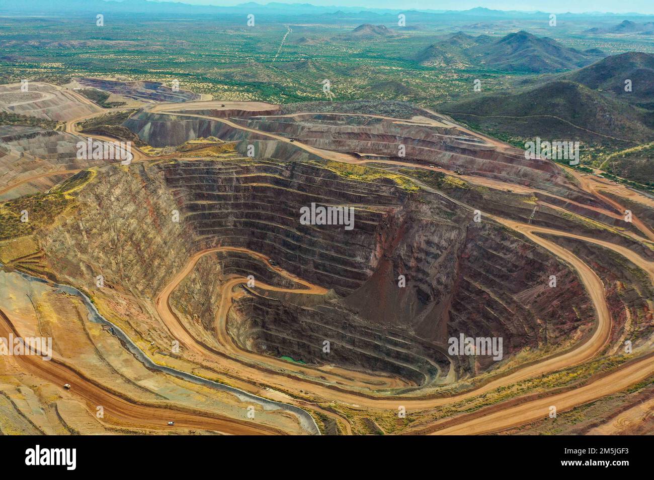 Gold mine pit, mining, industry, earth transformation, aerial, excavation, earth, layers of the earth,mina de cobre, copper mine  Tajo de mina de Oro, Stock Photo