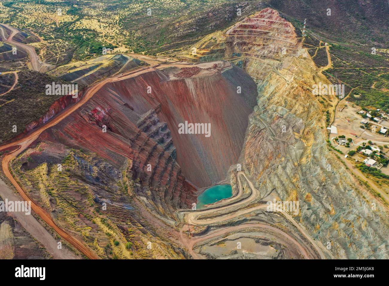 Gold mine pit, mining, industry, earth transformation, aerial, excavation, earth, layers of the earth,mina de cobre, copper mine  Tajo de mina de Oro, Stock Photo