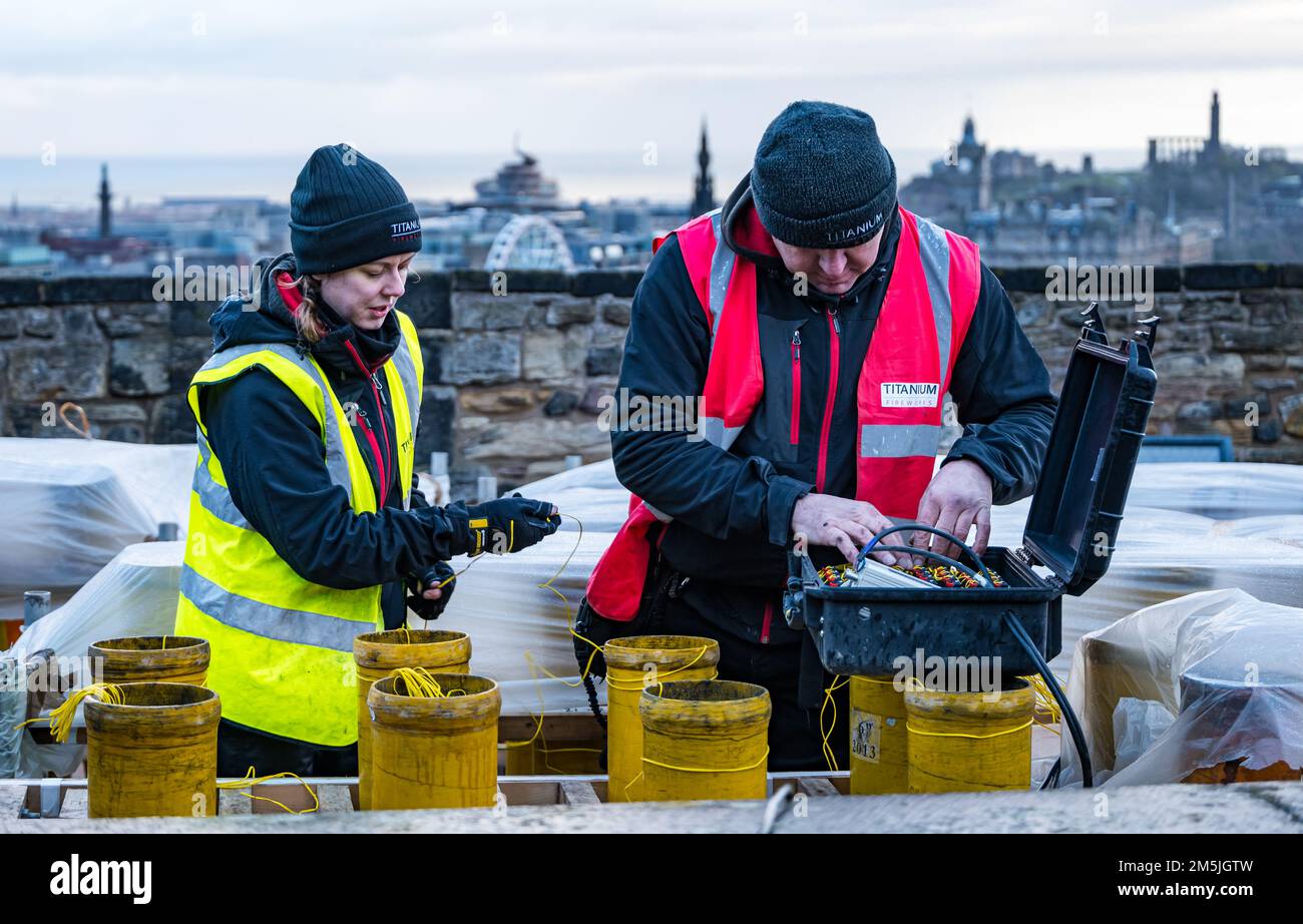 Titanium Fireworks staff preparing fuse wires for firework display, Edinburgh Castle, Scotland, UK Stock Photo