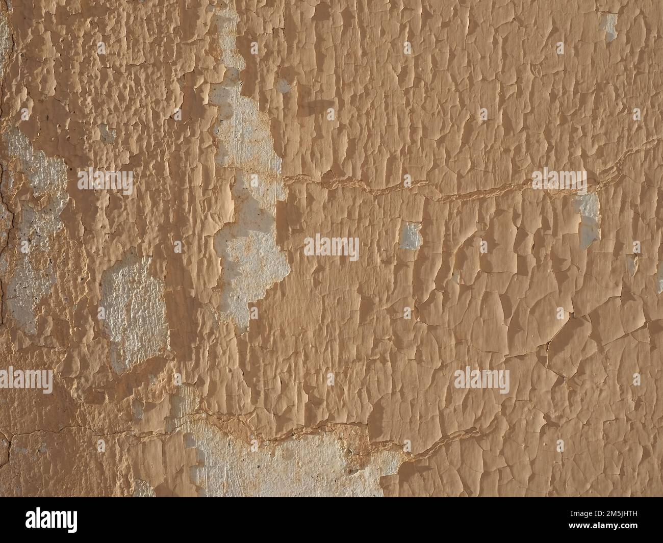 cracked paint peeling off an old wall Stock Photo Alamy