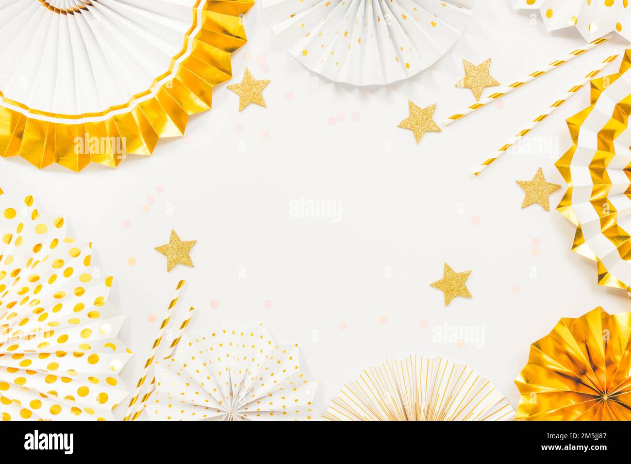 Party  background with paper fans, party decoration, party celebration in white and golden tone Stock Photo