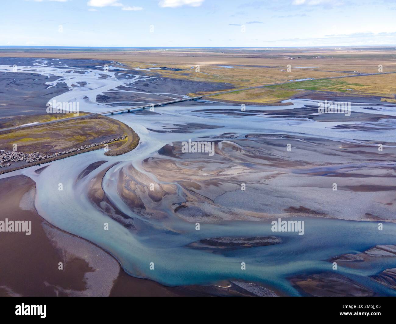An aerial drone view of a huge riverbed and delta, glacial river system