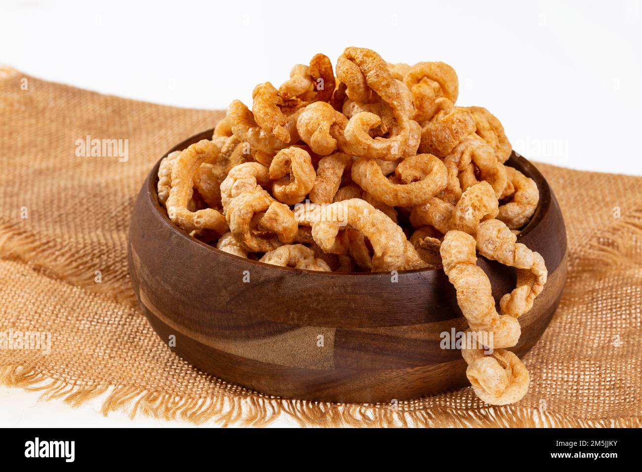 Tasty Snacks - Crispy Pork Cracklings; Dehydrated Pigskin. Stock Photo