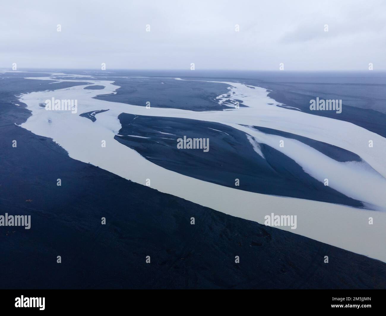 An aerial drone view of a huge riverbed and delta, glacial river system