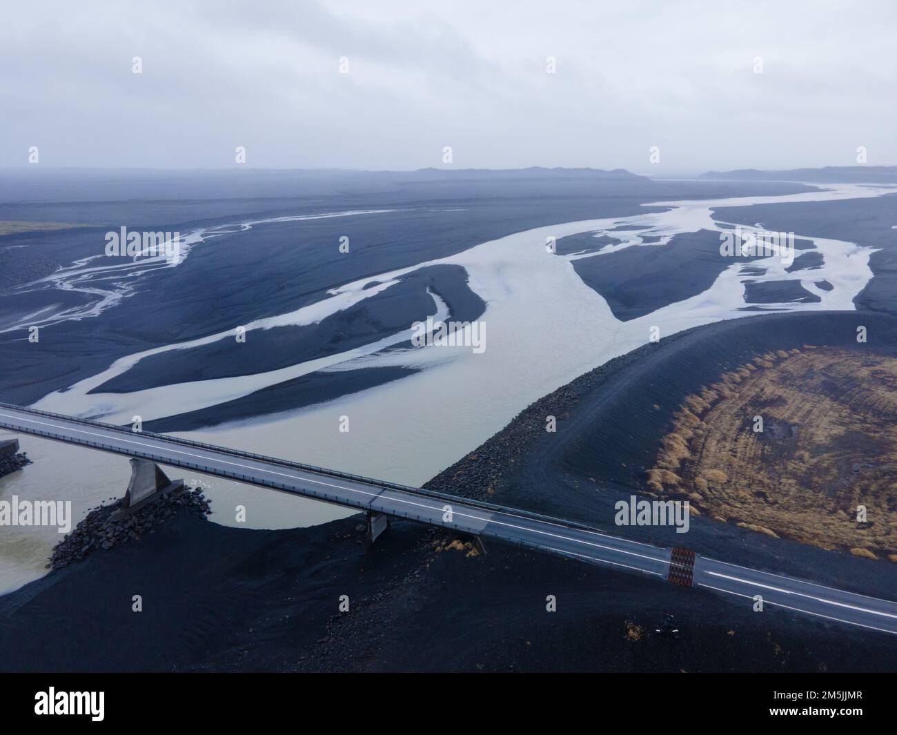 An aerial drone view of a huge riverbed and delta, glacial river system