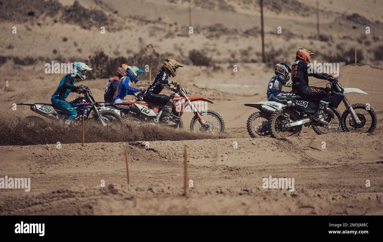 Professional motocross riders take off during the Motocross Jam Fest
