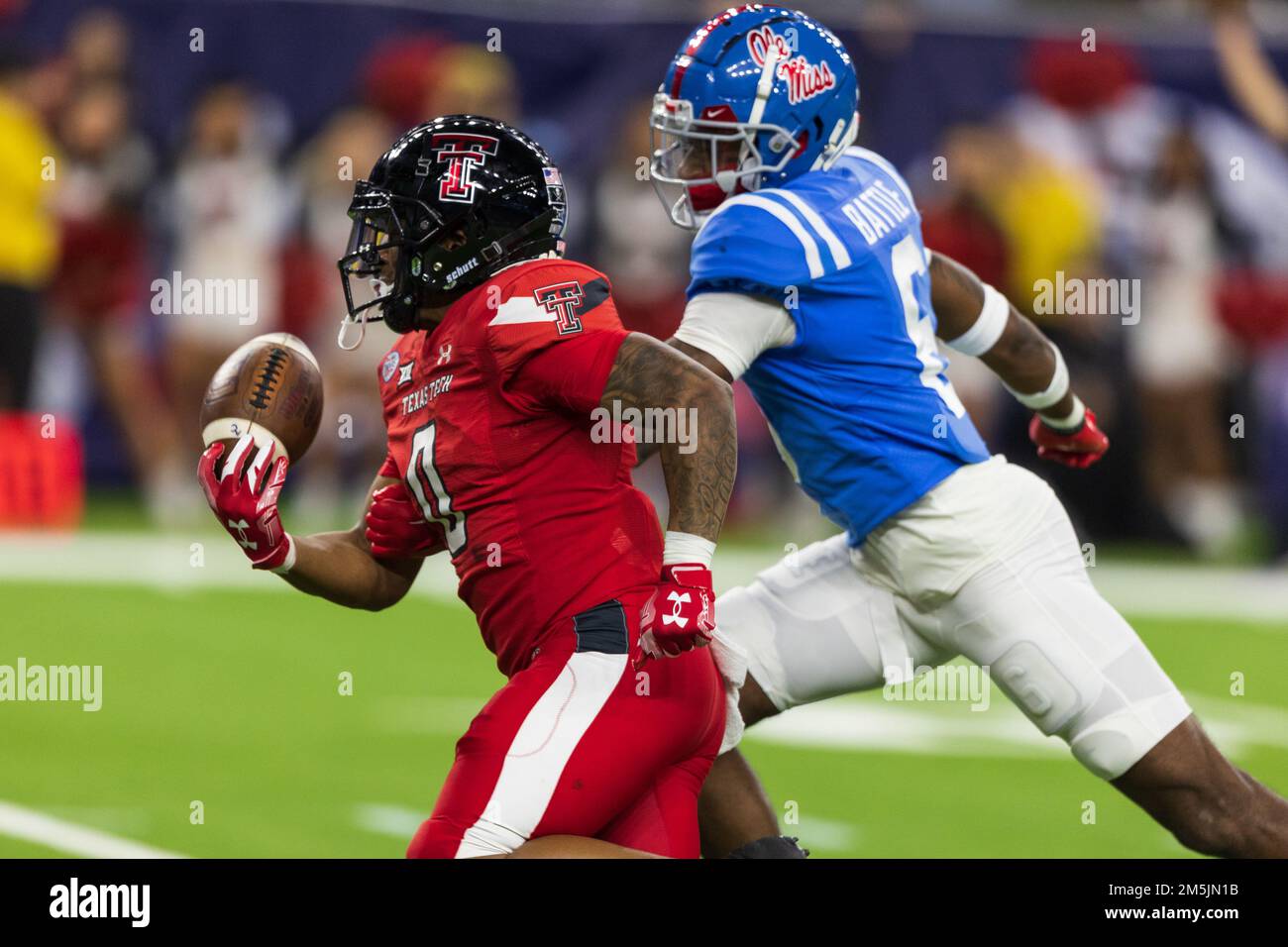 Ole Miss Rebels cornerback Miles Battle (6) knocks the ball free froms  Texas Tech Red Raiders running back Cam'Ron Valdez (0) causing the ball to  go o Stock Photo - Alamy