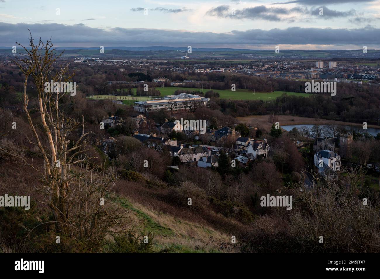 Thursday December 29th 2022: Edinburgh Scotland, UK. A view of Duddingston Village from Arthurs Seat. Also in the picture is Holy Rood High School Stock Photo