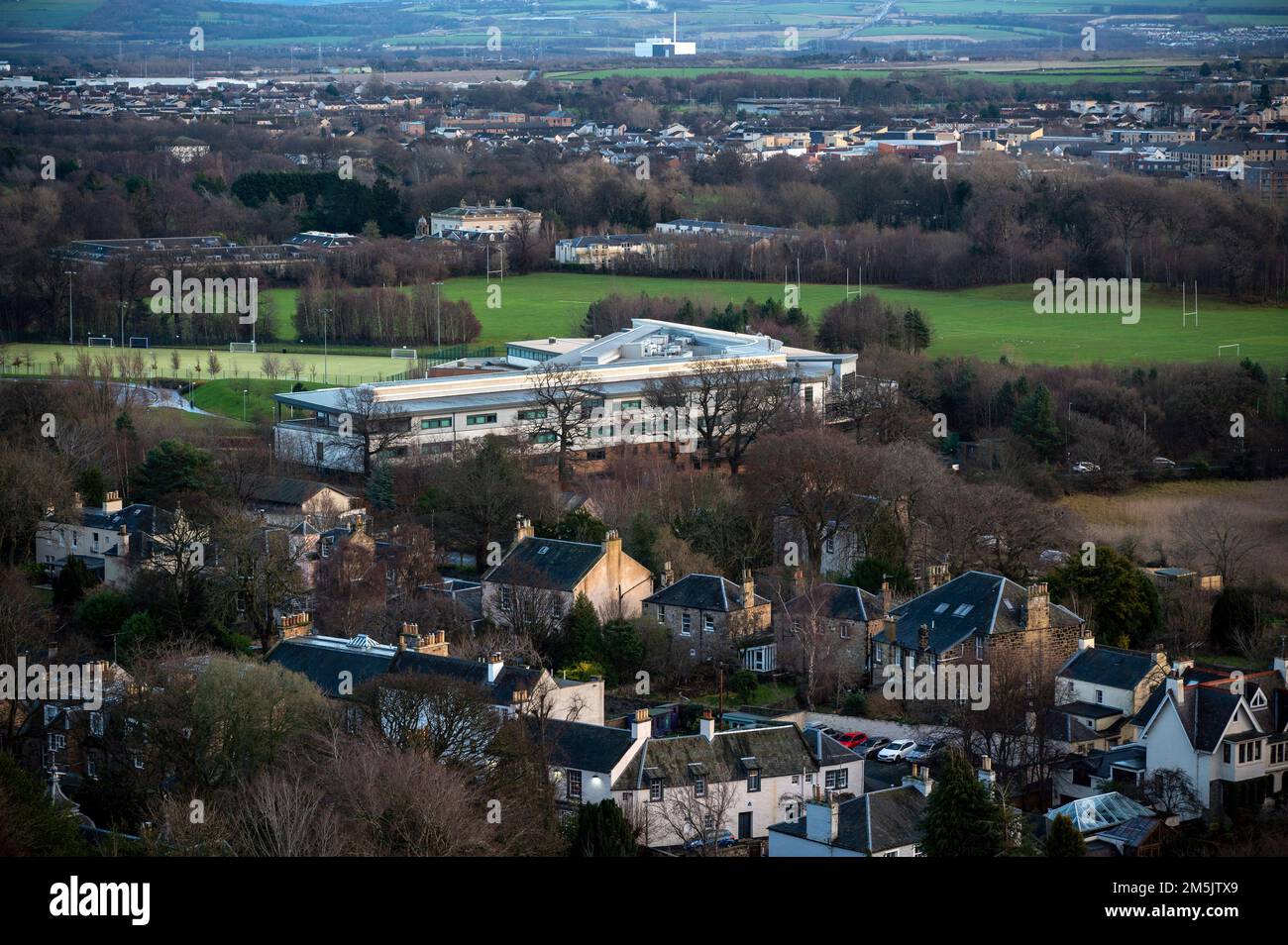 Thursday December 29th 2022: Edinburgh Scotland, UK. A view of Duddingston Village from Arthurs Seat. Also in the picture is Holy Rood High School Stock Photo