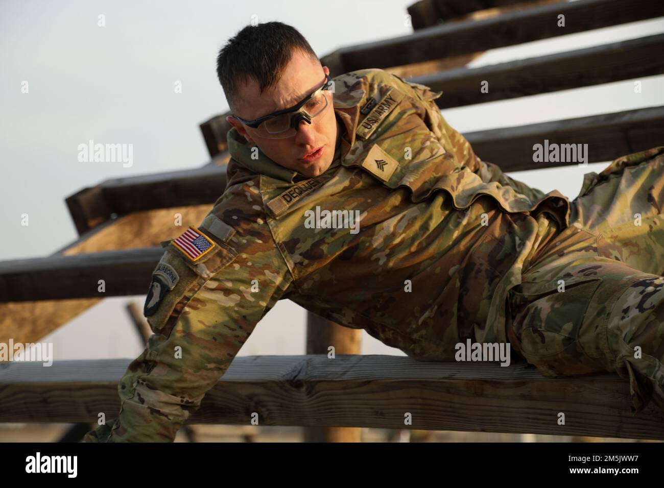 Sgt. Nathaniel Declue a Combat Medic Specialist assigned to 3-2 General Support Aviation Battalion, 2nd Combat Aviation Brigade, 2nd Infantry Division, attempts the weaving obstacle during the Best Warrior Competition, 21 Mar. 2022, Camp Humphreys, Republic of Korea. The BWC is held to recognize the best Soldiers of the 2CAB through various tests including a ruck march, obstacle course and a Soldier of the quarter board. Stock Photo