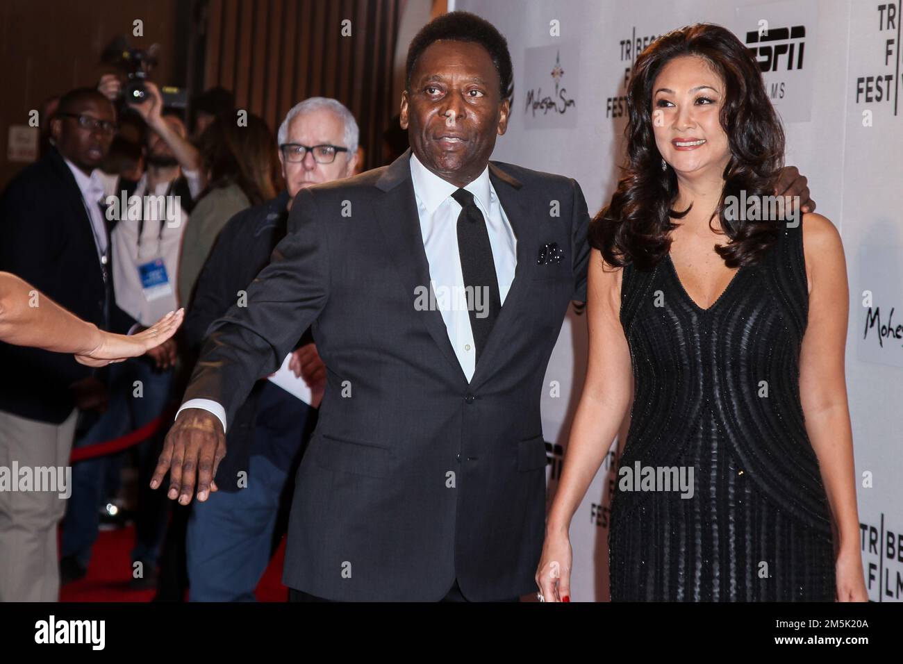 NEW YORK, NY, USA. 23 APRIL, 2016. Former Brazilian footballer Pele and Marcia Aoki  attends the 'Pele: Birth Of A Legend' World Premiere during the 2 Stock Photo
