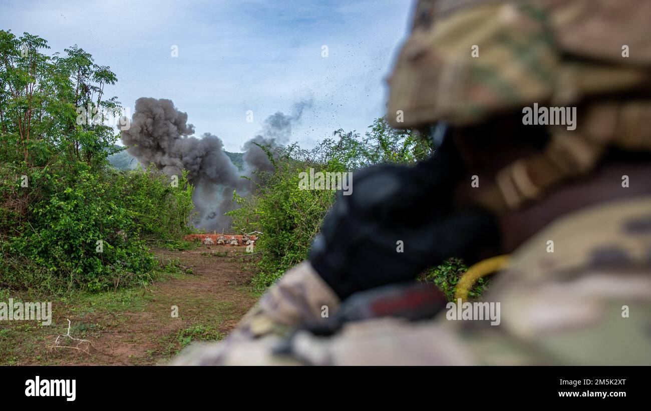 A Bangalore torpedo detonates, clearing an objective for forces to move through to assault their final objective, Mar. 22, 2022, Fort Thanarat, Thailand. Air Assaults allow troops to rapidly insert near an objective and utilize the element of surprise during the attack. Stock Photo