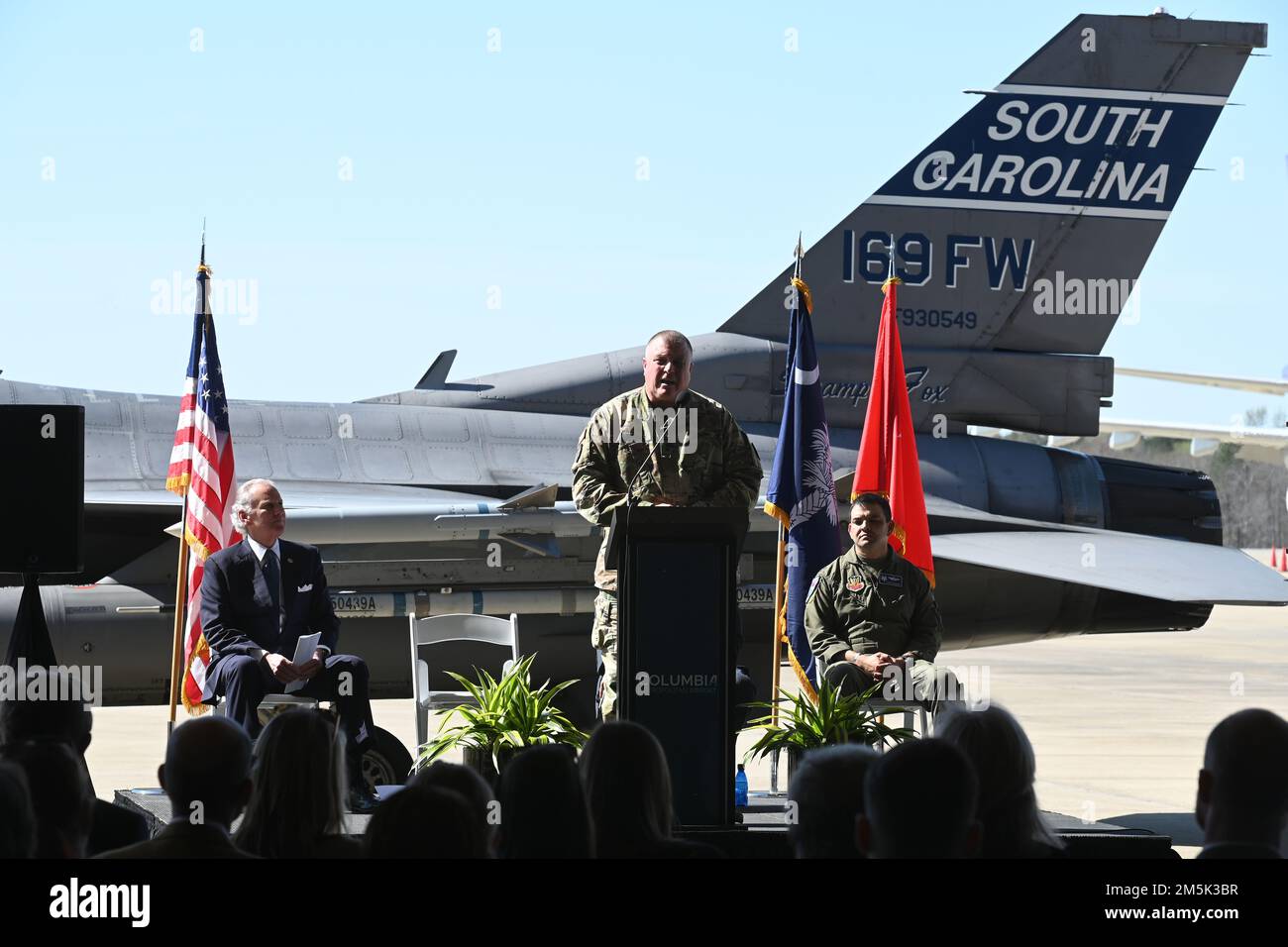 U.S. Army Maj. Gen. Van McCarty, The Adjutant General of South Carolina, speaks to local media and distinguished visitors at the Columbia Metropolitan Airport West Cargo Hangar, Columbia, South Carolina during a press conference, March 21, 2022. Columbia Metropolitan Airport hosts a press conference to announce a six-month temporary move of F-16 fighter jet flying operations from the the South Carolina Air National Guard's 169th Fighter Wing at nearby McEntire Joint National Guard Base to their airport. This joint partnership, regarding the temporary relocation of F-16 aircraft, will begin in Stock Photo