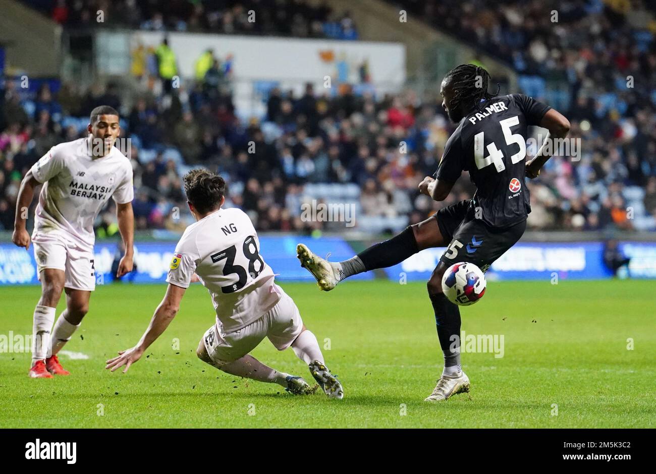 Coventry City's Kasey Palmer has a shot blocked by Cardiff City's Perry Ng during the Sky Bet Championship match at the Coventry Building Society Arena, Coventry. Picture date: Thursday December 29, 2022. Stock Photo