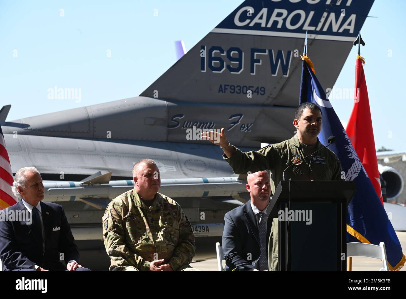 U.S. Air Force Col. Quaid Quadri, 169th Fighter Wing commander, speaks to local media and distinguished visitors at the Columbia Metropolitan Airport West Cargo Hangar, Columbia, South Carolina during a press conference, March 21, 2022. Columbia Metropolitan Airport hosts a press conference to announce a six-month temporary move of F-16 fighter jet flying operations from the the South Carolina Air National Guard's 169th Fighter Wing at nearby McEntire Joint National Guard Base to their airport. This joint partnership, regarding the temporary relocation of F-16 aircraft, will begin in April 202 Stock Photo