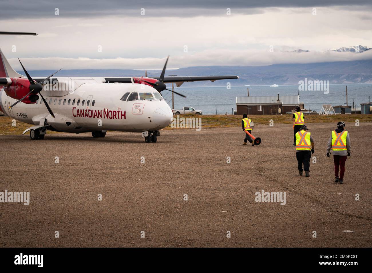 ATR 72 cargo and passenger aircraft belonging to Canadian North Airlines on the gravel airstrip at Pond Inlet Baffin Island Nunavut Canada Stock Photo Alamy