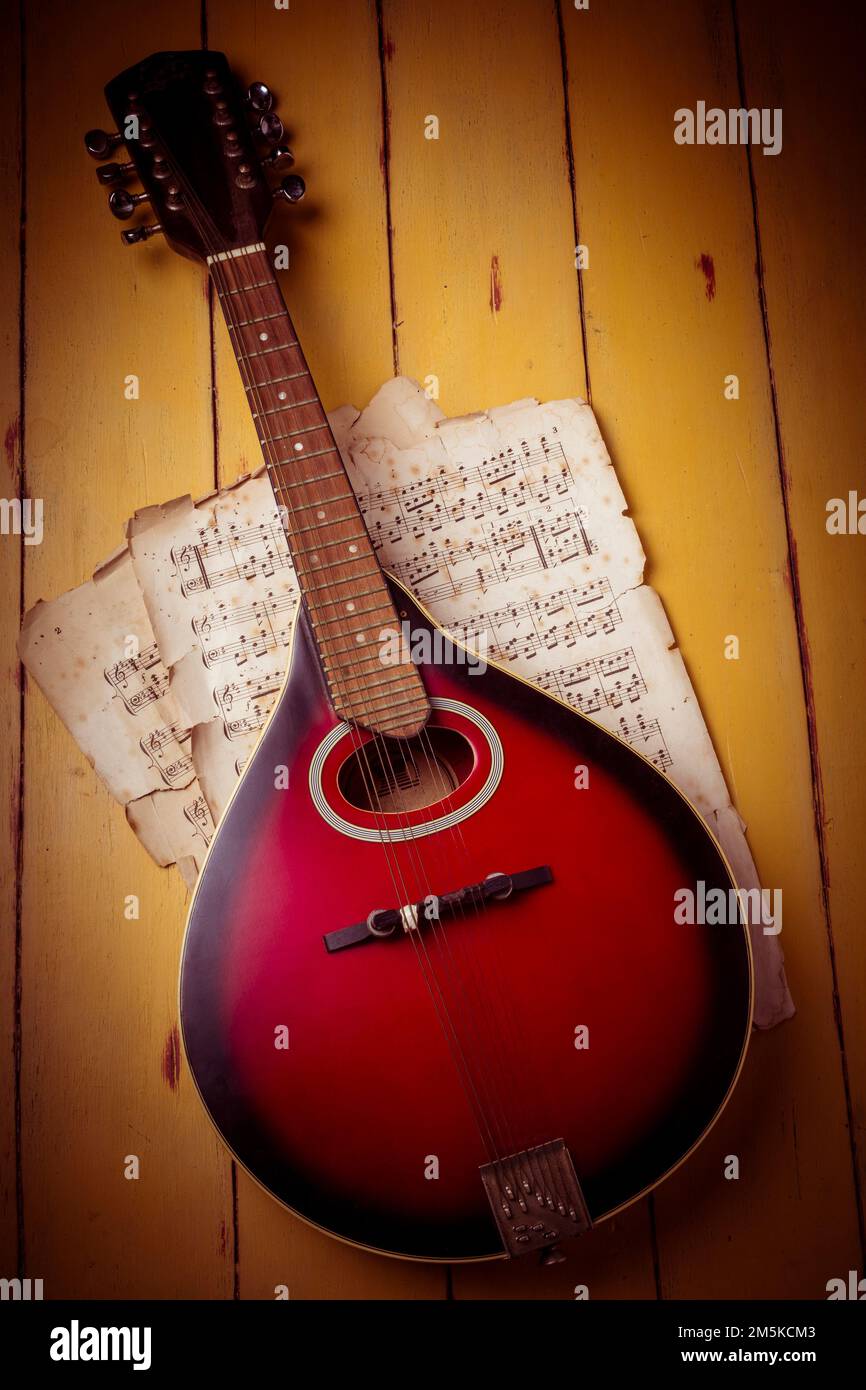 Wonderful Red Violin On Sheet Music Still Life Stock Photo
