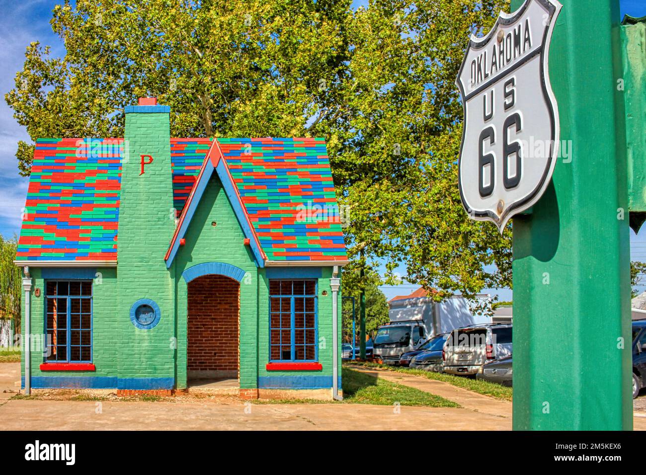 A vintage 1930's cottage-style Phillips 66 gas station sits on Manvel Avenue, Route 66, in Chandler Oklahoma. Stock Photo