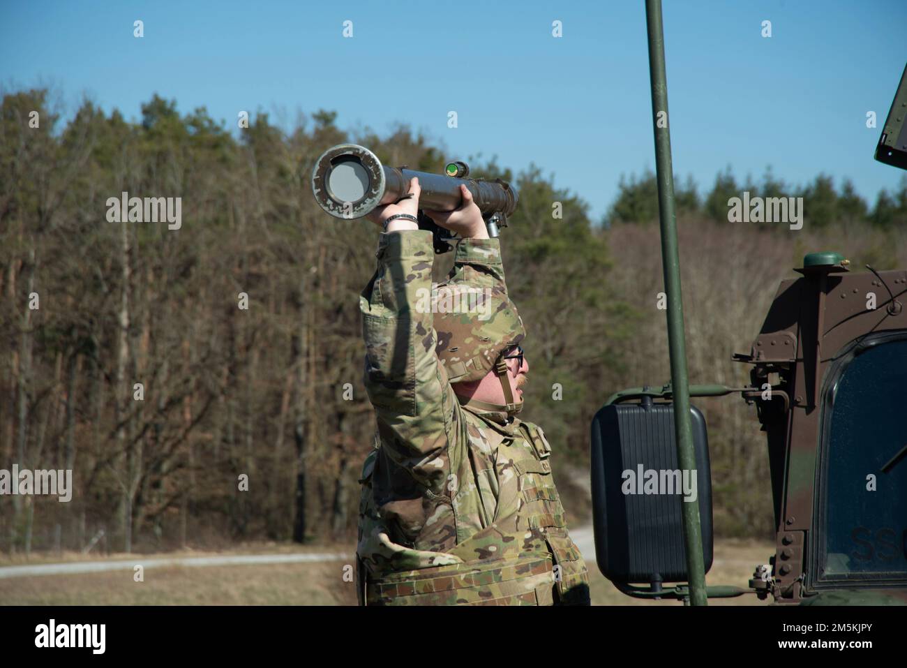 U.S. Soldiers with 5th Battalion, 4th Air Defense Artillery Regiment (5-4 ADAR), Delta Battery conduct Avenger missile reload procedures training at Oberdachstetten Training Area, Ansbach, Germany, March 22, 2022 . Stock Photo